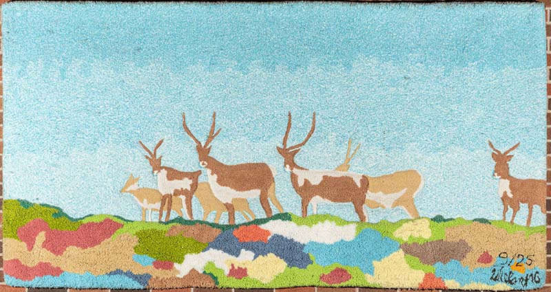 Wieland’s &quot;Wildlife Landscape&quot; came on the heels of a similar commission for the Toronto Subway: &quot;Barren Ground Caribou&quot;, a quilt work which was begun in 1975 and completed and installed in 1978 (Kendal Ave. exit, Spadina Subway Station). Wieland wanted to bring the caribou into the subway as a reminder of the natural world above ground. Something of the same could be said of this tapestry. Although &quot;Wildlife Landscape&quot; stands on its own, we might also see it as a “preparatory study” for the subway commission. &quot;Wildlife Landscape&quot; is physically located at Seneca @ York in the S Building.