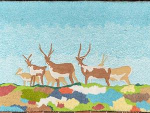 Wieland’s "Wildlife Landscape" came on the heels of a similar commission for the Toronto Subway: "Barren Ground Caribou", a quilt work which was begun in 1975 and completed and installed in 1978 (Kendal Ave. exit, Spadina Subway Station). Wieland wanted to bring the caribou into the subway as a reminder of the natural world above ground. Something of the same could be said of this tapestry. Although "Wildlife Landscape" stands on its own, we might also see it as a “preparatory study” for the subway commission. "Wildlife Landscape" is physically located at Seneca @ York in the S Building.